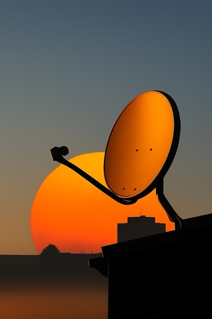 Sunset and Satellite Dish Silhouette